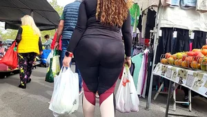 Milf with a tremendous hot ass in the market