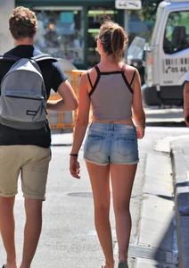 Beautiful teen out with boyfriend in short jean shorts
