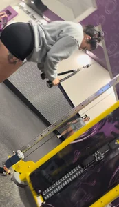 Beautiful gym asian (?) slightly bent over