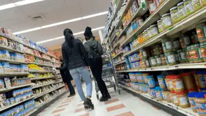 Sexy Asian girl grocery shopping in tight jeans with a nice ass