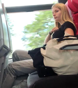 Hot busty blonde on train