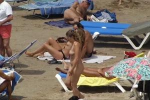Girls on a nude beach in Sitges, Spain