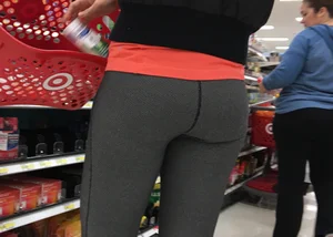 Skinny and tall milf shopping at Target in tight leggings
