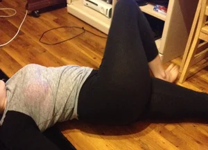 Girl in tights lying on the floor