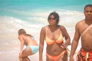 Various sexy candid girls in bikinis at the beach