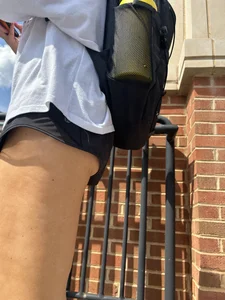 SIDE views of college girls walking to class showing legs and ass