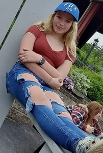 Cute blonde teen wearing ripped jeans busted pic