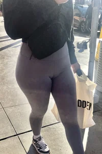 Sexy girl in grey leggings showing ass and cameltoe