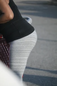 Ebony milf out shopping in grey leggings