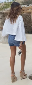 Flat ass leggy girl in denim shorts