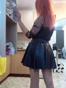 Candid Tattooed Redhead in a Leather Skirt With Thin Sexy Legs Home Creepshot