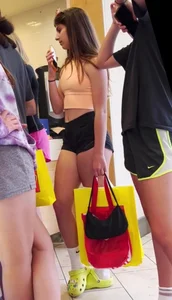 Young girl in a top and mini shorts creepshot