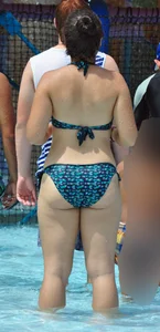 Thick brunette in a bikini while in the pool