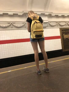 Cute Skinny Teen in Jean Mini Shorts Standing on the Subway Platform