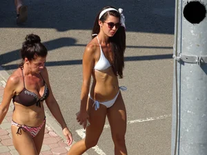 Sexy bikini babe in a white bikini at the pool with camel toe