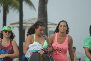Saint Patrick's Day girls in bikinis at Deerfield Beach in Florida