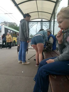 Chubby Milf at the Bus Stop in Denim Mini Shorts