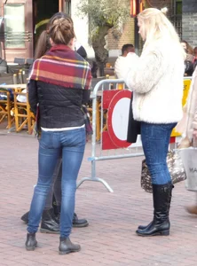Skinny candid girl wearing tight blue jeans on the street creepshot