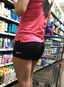 Sexy blonde ass in spandex shorts shopping at Walmrt