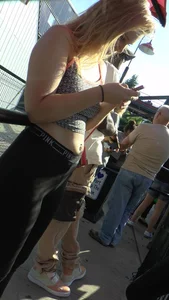 Blonde teen in a top and leggings