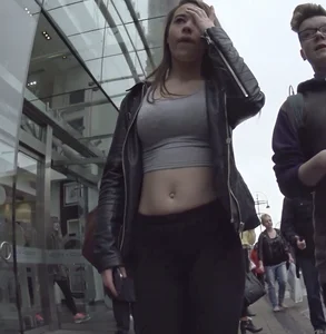 Cute teen with big boobs showing stomach and a nice ass in leggings