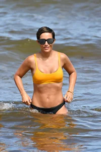 Frankie Bridge nip slips in a bikini on the beach