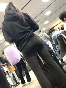 Tight asian lifts up short to show off booty to me at airport