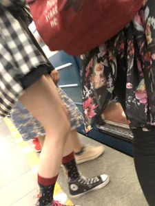 Cute Skinny Teen in Knee-Socks And Shorts Sitting With Crossed Legs in a Subway Train Creepshots Gallery