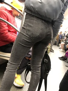 Candid girl with an incredible ass in grey jeans subway creepshots