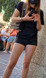 Awesome girl in shorts wearing a mask creepshots