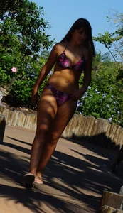 Two nice asses in thong bikinis at a Disney waterpark
