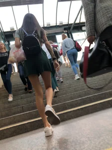 Girl in Shorts with Long Skinny Legs on the Subway Escalator Candid