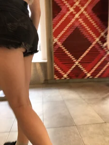 Cute Teen Girl in Mini-Shorts Walking into a Cafe Legs And Booty Closeups