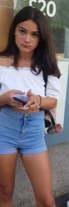 Incredibly cute young girl in denim shorts and a top street creepshot, busted the photographer