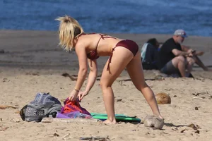 Hilary Duff in maroon bikini on the beach with a big booty