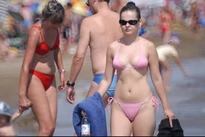 Girls on a nude beach in Bibione, Italy