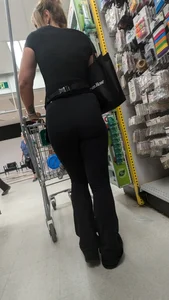 Beautiful tight blonde in black legging at dollar strore. oc