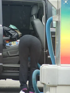 Girls cleaning their cars in jeans and pants