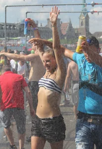 Boobs out in public in either bikini tops or bras