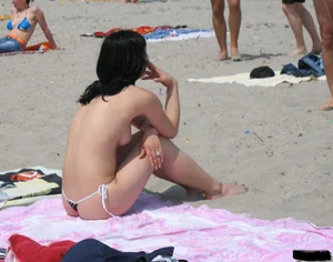 Beach voyeur babes in bikinis, thongs and topless