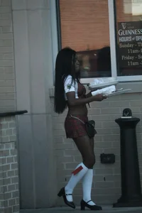 Sexy ebony Tilted Kilt employee in her uniform
