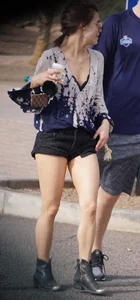 Cutie walking her dog in short denim shorts and showing a bit of cheek