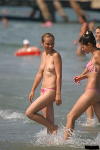 Sexy candid topless and nude beach girls