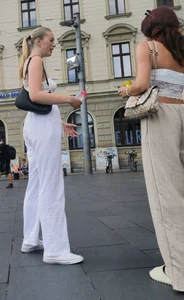 Long blonde braless in a white outfit (many pictures)