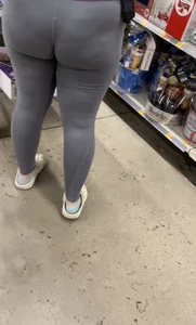 Hot milf wearing grey leggings! I have a video of it jiggling while she walks