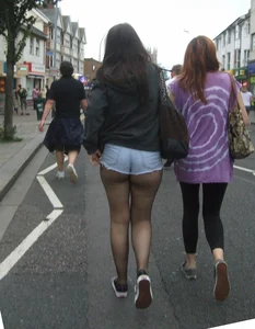 Candid cunny brunette in pantyhose and shorts showing her ass cheeks
