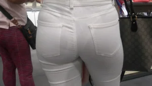 Latina with a nice ass in tight white jeans