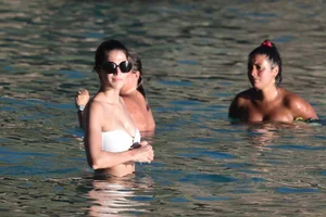 Iris Mittenaere in a white thong bikini on the beach in St Martin