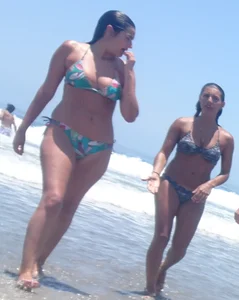 Thick and skinny sexy friends on the beach in bikinis