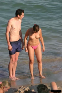 Beach voyeur girls in bikinis, thongs and topless